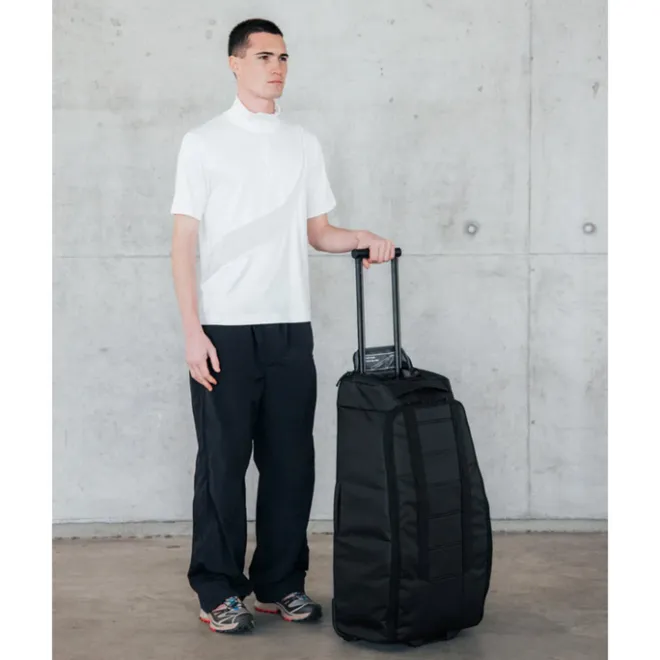 Clearance Db Journey Hugger Roller Bag Check-in 60L black out